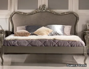 LAUREN - Solid wood double bed with upholstered headboard _ Guerra Vanni