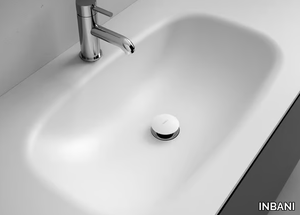 G1 - Corian® washbasin with integrated countertop _ INBANI