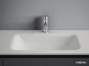 D1 - Corian® washbasin with integrated countertop _ INBANI