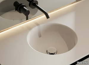 PRIME - Round single Solid Surface washbasin with integrated countertop _ INBANI