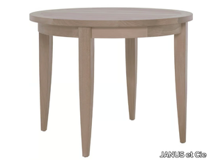 RELAIS - Round teak dining table _ JANUS et Cie