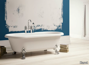 NEWPORT - Freestanding oval Kstone bathtub on legs _ Karol