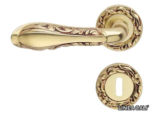 LIBERTY - Chromed brass door handle on rose with lock _ LINEA CALI'