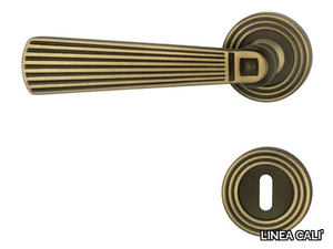 OPERA - Chromed brass door handle on rose with lock _ LINEA CALI'