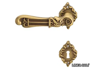 TIFFANY - Chromed brass door handle on rose with lock _ LINEA CALI'