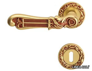 TIFFANY - Chromed brass door handle on rose with lock _ LINEA CALI'