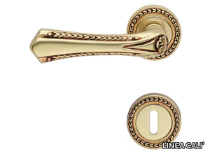 SISSI - Chromed brass door handle on rose with lock _ LINEA CALI'