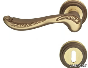 LADY - Chromed brass door handle on rose with lock _ LINEA CALI'