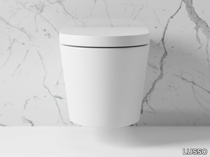 SENZA - Wall-hung rimless ceramic toilet _ LUSSO