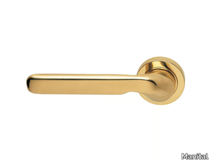 DAYTONA - Brass door handle with lock on rose _ Manital