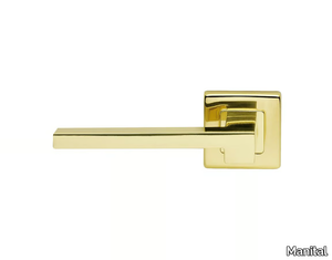 MORPHOS LIGHT - Brass door handle on rose with lock _ Manital