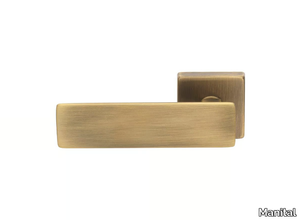 SPRING - Zinc door handle with lock on rose _ Manital