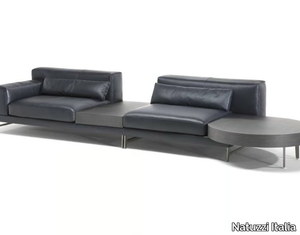 IDO - Sectional leather sofa with integrated magazine rack _ Natuzzi Italia