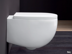 MILK - Wall-hung ceramic toilet _ Nic