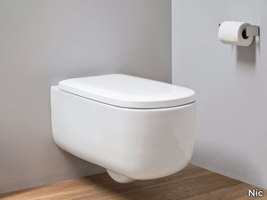 OVVIO - Wall-hung ceramic toilet _ Nic