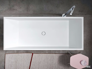 POOL - Freestanding rectangular Corian® bathtub _ Nic