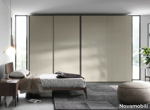 GOLA - Sectional wardrobe with sliding doors _ Novamobili