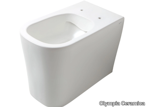 OMNIA - Floor mounted rimless Vitreous China toilet _ Olympia Ceramica