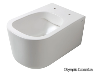 OMNIA - Wall-hung rimless Vitreous China toilet _ Olympia Ceramica