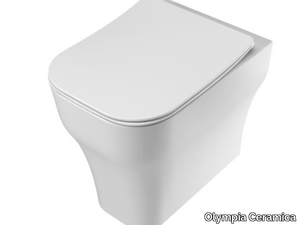 SYNTHESIS ECO - Rimless Floor mounted Vitreous China toilet _ Olympia Ceramica