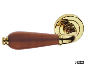 ALFA EASY - Brass door handle on rose _ Pasini