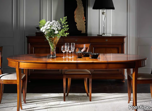 CAPRICCI - Extending oval cherry wood table _ Prestige