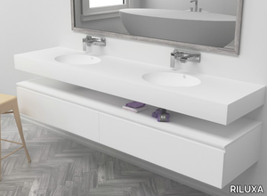 PURITY - Wall-mounted double oval Corian® washbasin _ RILUXA