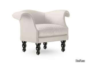 CASANOVA - Upholstered leather armchair with armrests _ Reflex