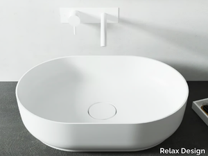 HORIZON - Countertop oval Luxolid® washbasin _ Relax Design