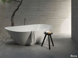 FONTE - Asymmetric freestanding Korakril™ bathtub _ Rexa