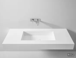 STAMPATO - Wall-mounted Corian® washbasin with integrated countertop _ Rexa