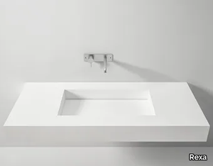 SCIVOLO - Wall-mounted Corian® washbasin with integrated countertop _ Rexa