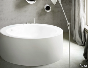 HOLE - Freestanding round Corian® bathtub _ Rexa