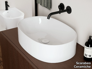 SKINNY - Oval countertop ceramic washbasin _ Scarabeo Ceramiche