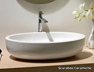 PLANET - Countertop oval ceramic washbasin _ Scarabeo Ceramiche