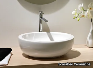 PLANET - Countertop oval ceramic washbasin _ Scarabeo Ceramiche