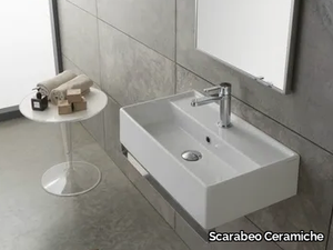 TEOREMA 60X35R - Wall-mounted ceramic washbasin _ Scarabeo Ceramiche