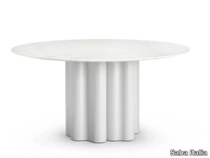 TEATRO MAGICO - Round table with polyurethane base and marble top _ Saba Italia