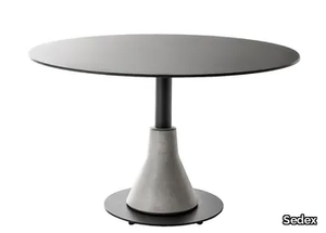 BIG FOOT - Round cement dining table _ Sedex