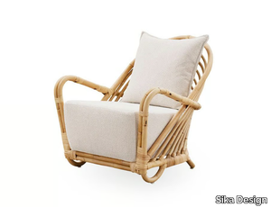 CHARLOTTENBORG - Rattan and fabric armchair with armrests _ Sika Design