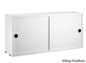 STRING® SYSTEM CABINET WITH SLIDING DOOR - MDF wall cabinet with sliding doors _ String Furniture