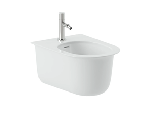 CHIC - Wall-hung ceramic bidet with overflow _ Artceram