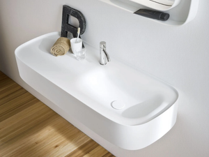 FONTE - Wall-mounted Corian® washbasin with integrated countertop _ Rexa