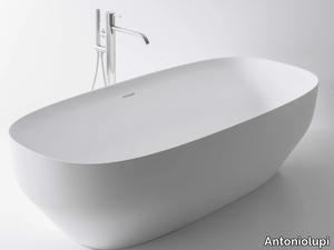 AGO - Freestanding oval Ceramilux® bathtub _ Antoniolupi