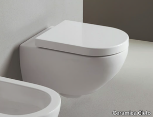 ENJOY - Wall-hung back to wall ceramic toilet _ Ceramica Cielo