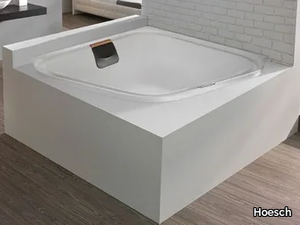 ERGO+ - Built-in asymmetric corner acrylic bathtub _ Hoesch
