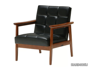 K CHAIR - Tufted vinyl leather easy chair with armrests _ KARIMOKU