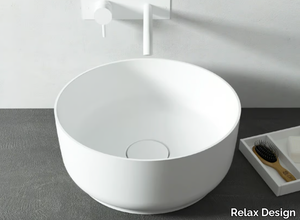 HORIZON - Countertop round composite material washbasin _ Relax Design