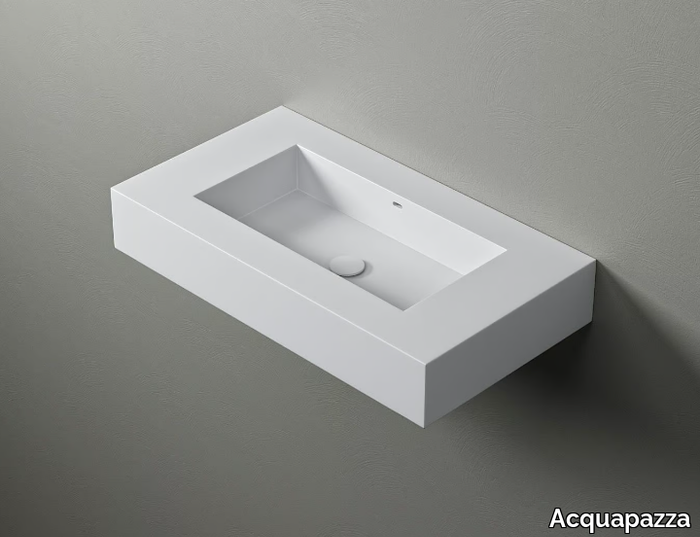 KUBE60 - Wall-mounted Corian® washbasin with integrated countertop _ Acquapazza