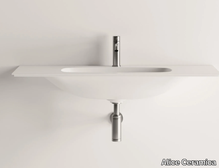 NUR - Wall-mounted washbasin with integrated countertop _ Alice Ceramica